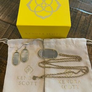 Kendra Scott gold with mother of pearl earrings and necklace.